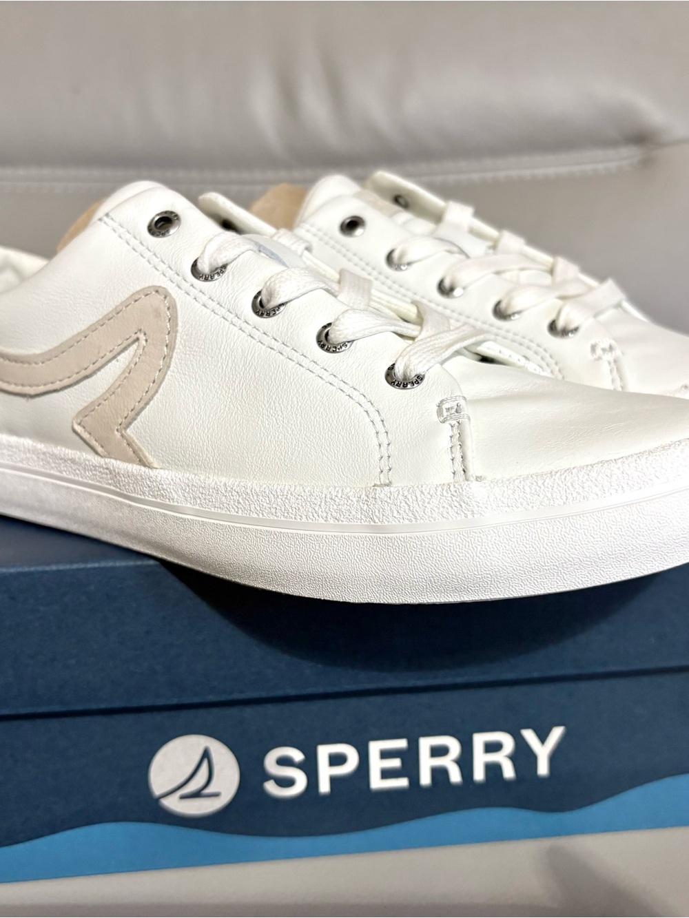 Sperry women’s White Leather Boat Sneaker with Beige Accent